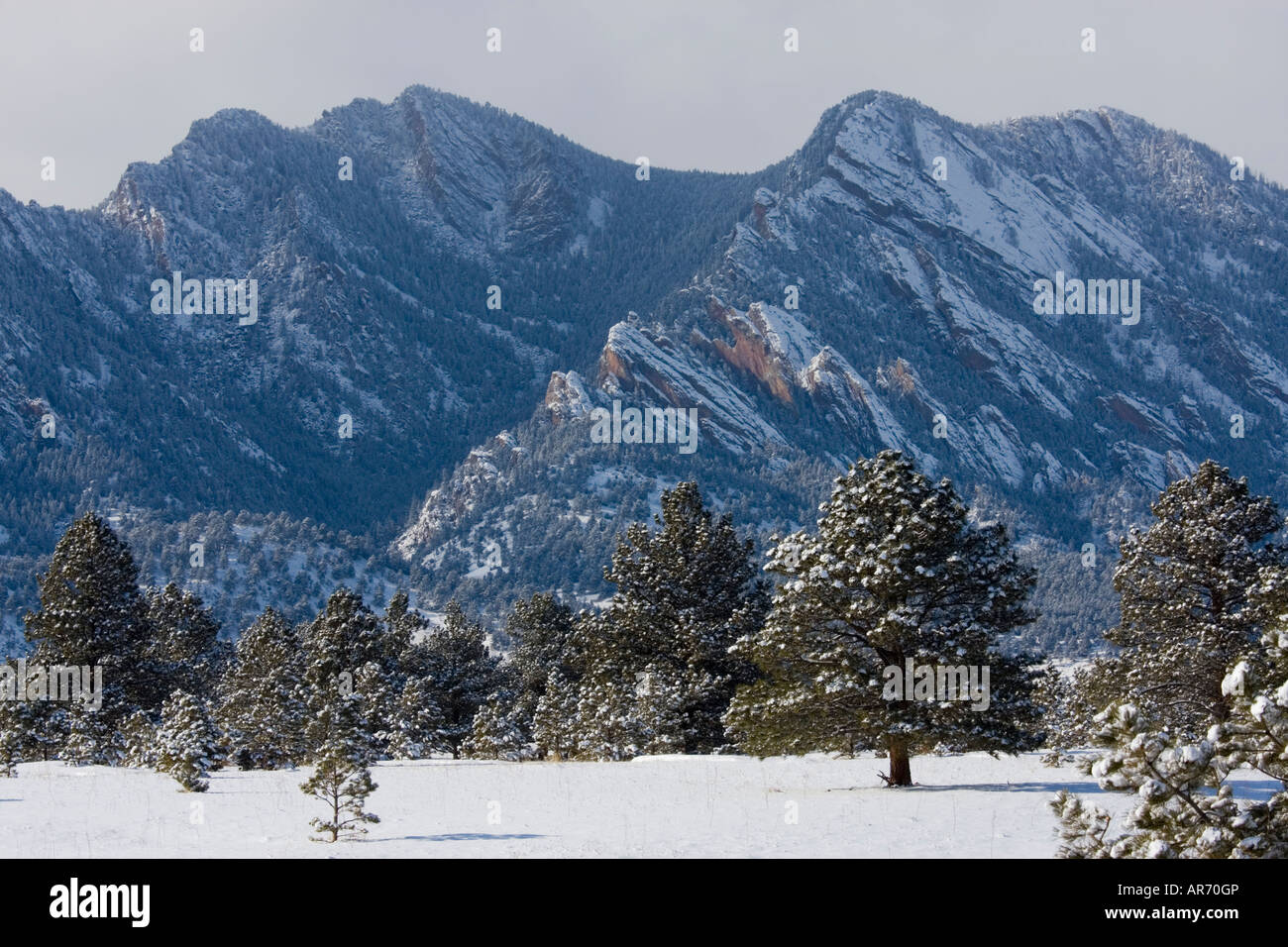 The Boulder Flatirons on a cold windy Colorado winter afternoon Stock