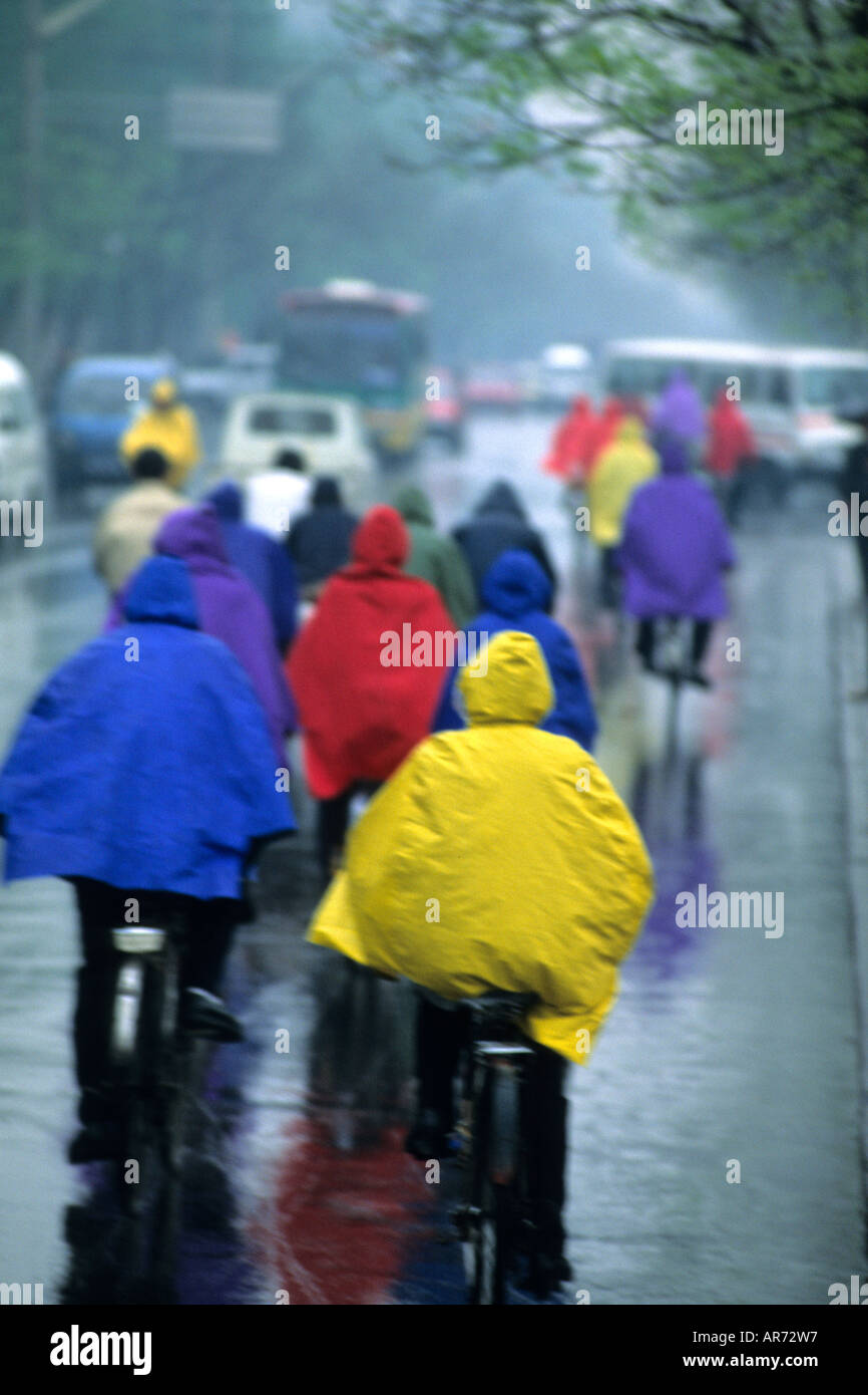 Colorful graphic image of bikers riding bikes in rain with colorful