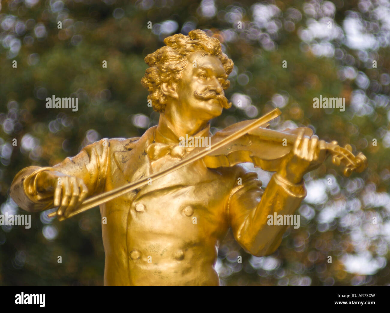 VIENNA AUSTRIA Golden statue of music composer Johann Strauss playing