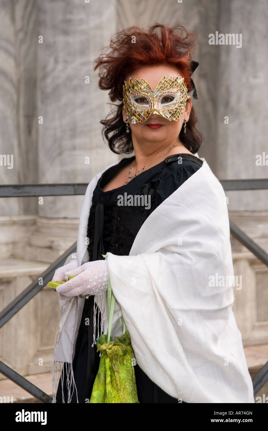 Reveller in mask and costume at the Venice carnival in St Mark's Square ...