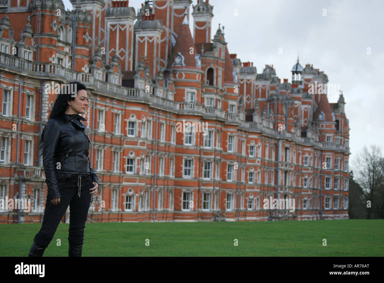Woman model in black posing at Royal Holloway University, Egham, Surrey, England, United Kingdom Stock Photo