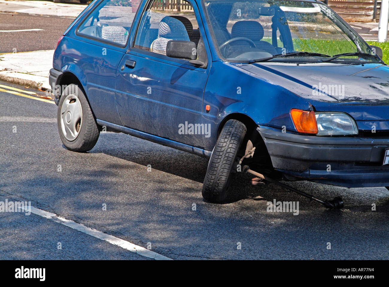 Collapsed suspension on car Stock Photo 9120915 Alamy