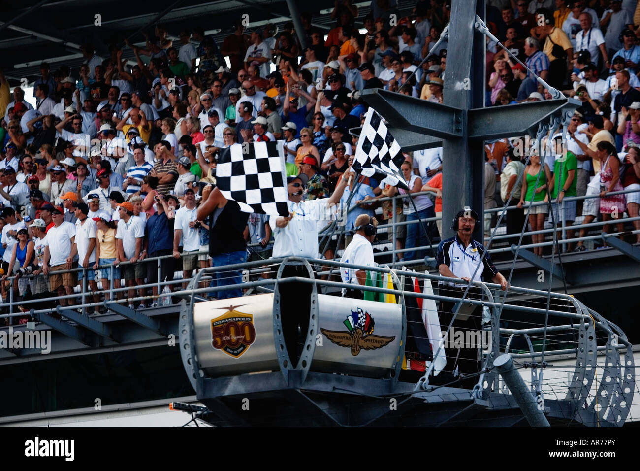 checkered flags wave at the finish line at the Indianapolis 500 in Indianapolis, Indiana Stock Photo