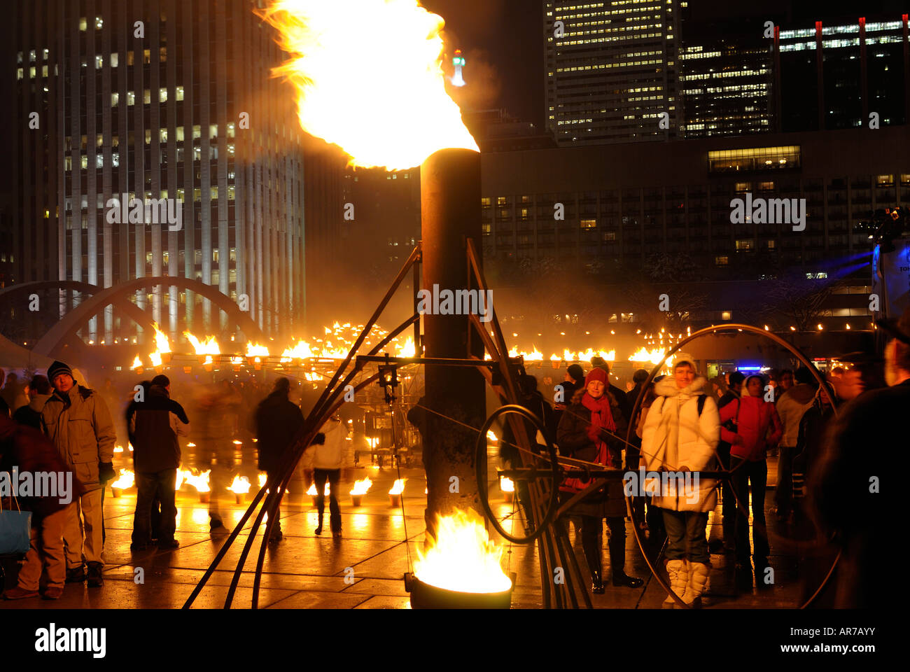 Cie Carabosse performing with flame thrower at Wintercity Nights of Fire in Nathan Philips Square Toronto in winter Stock Photo