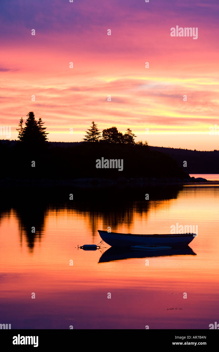 A skiff at sunrise in Eggemoggin Reach in Little Deer Isle, Maine Stock