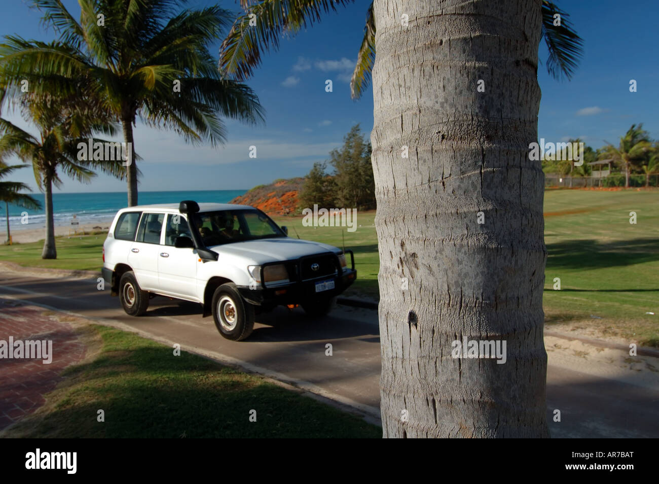 Well equipped 4WD car driving up off Cable Beach Broome Kimberley