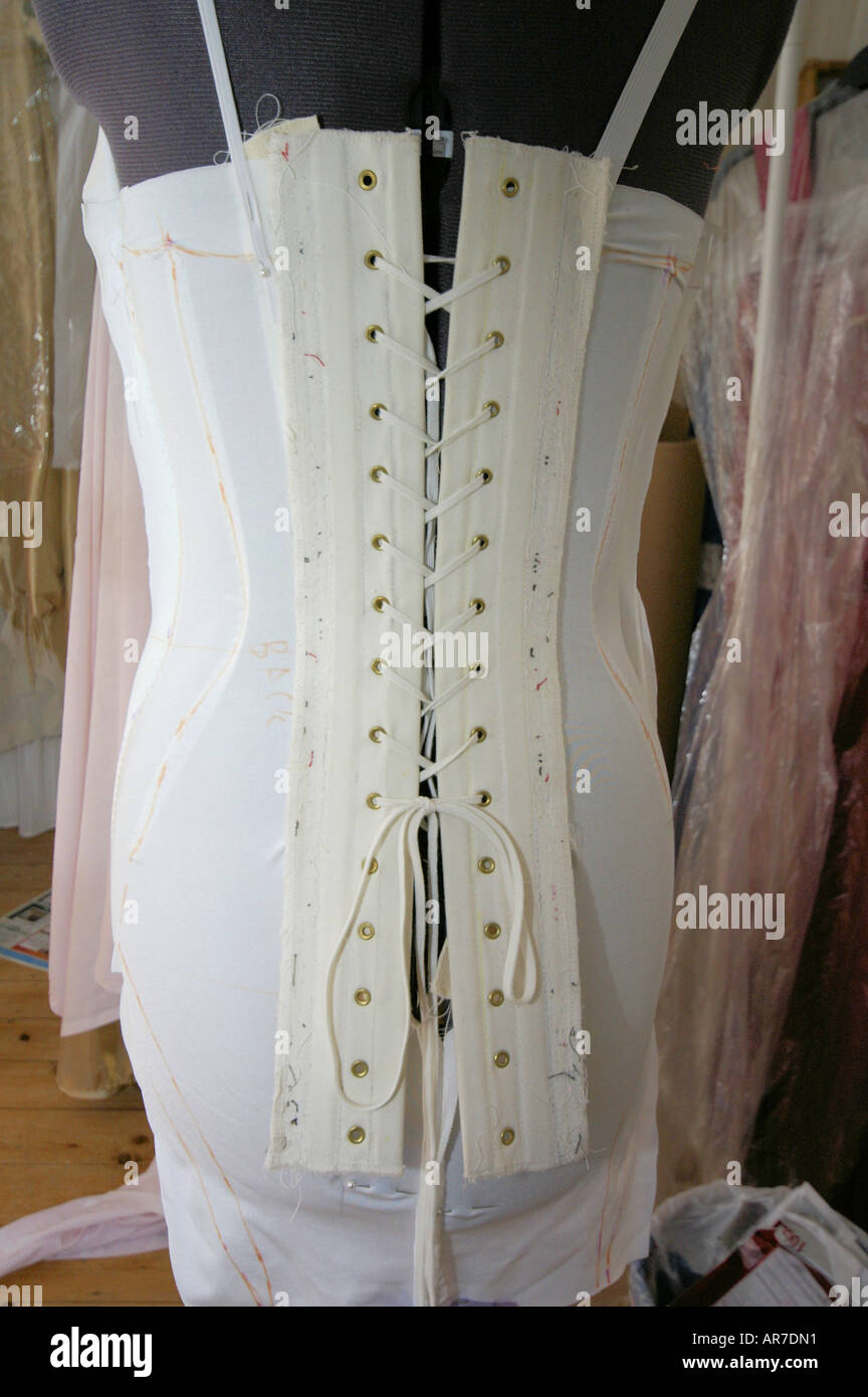 close up of lacings at the back of a corset being made in the studio of