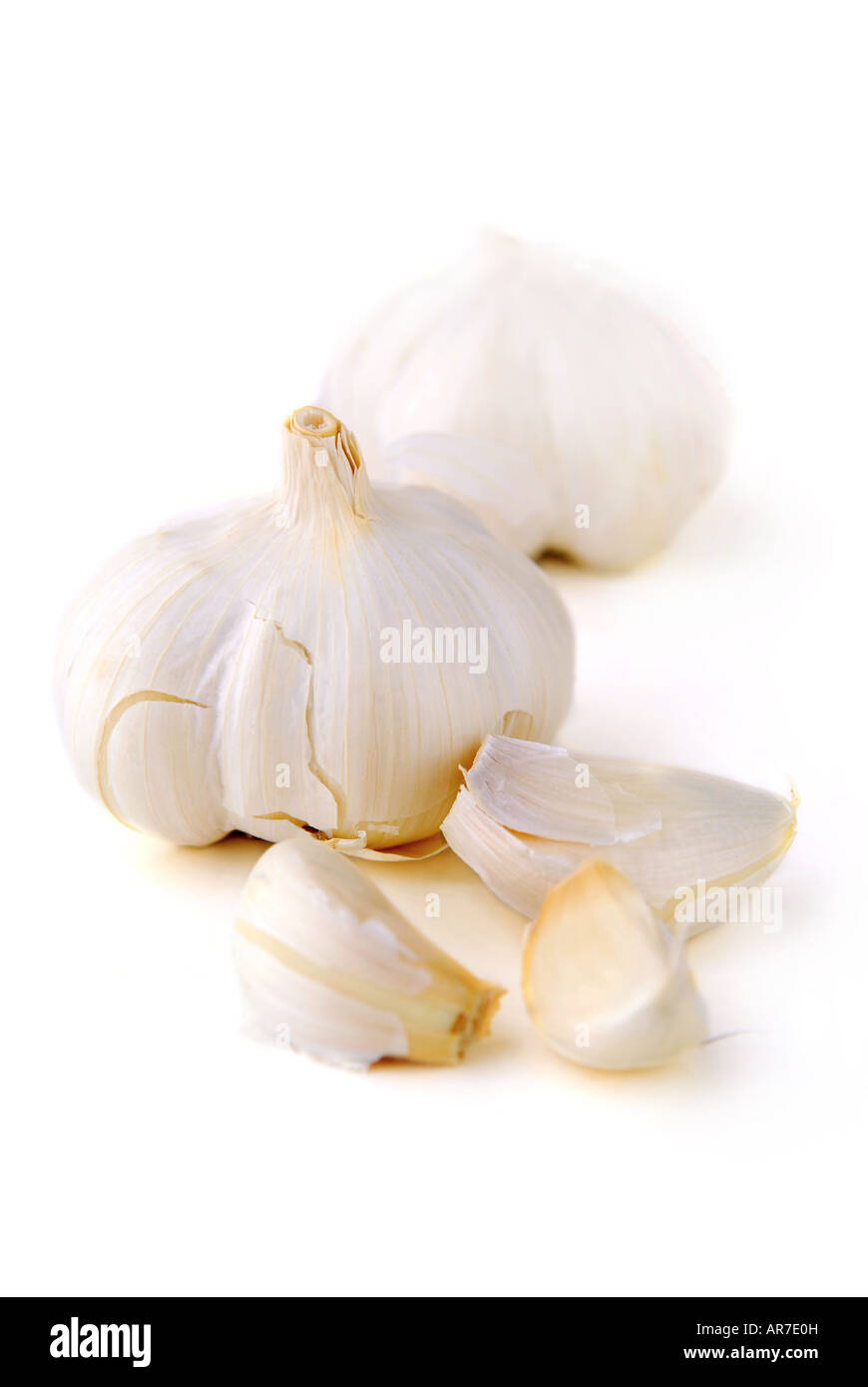 Bulbs and cloves of garlic isolated on white background Stock Photo - Alamy
