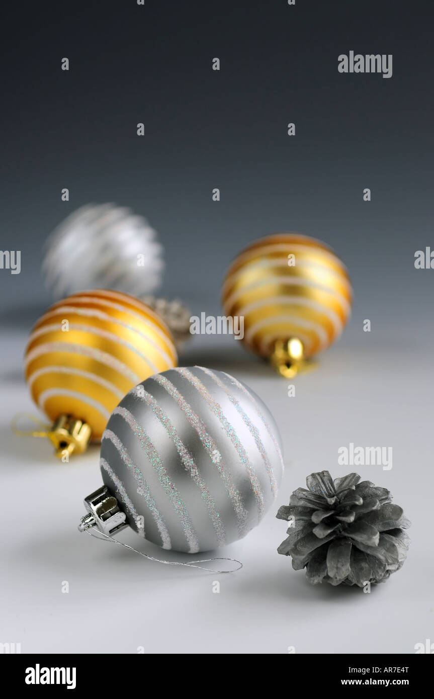 Christmas background with glass bauble ornaments and pine cones Stock Photo
