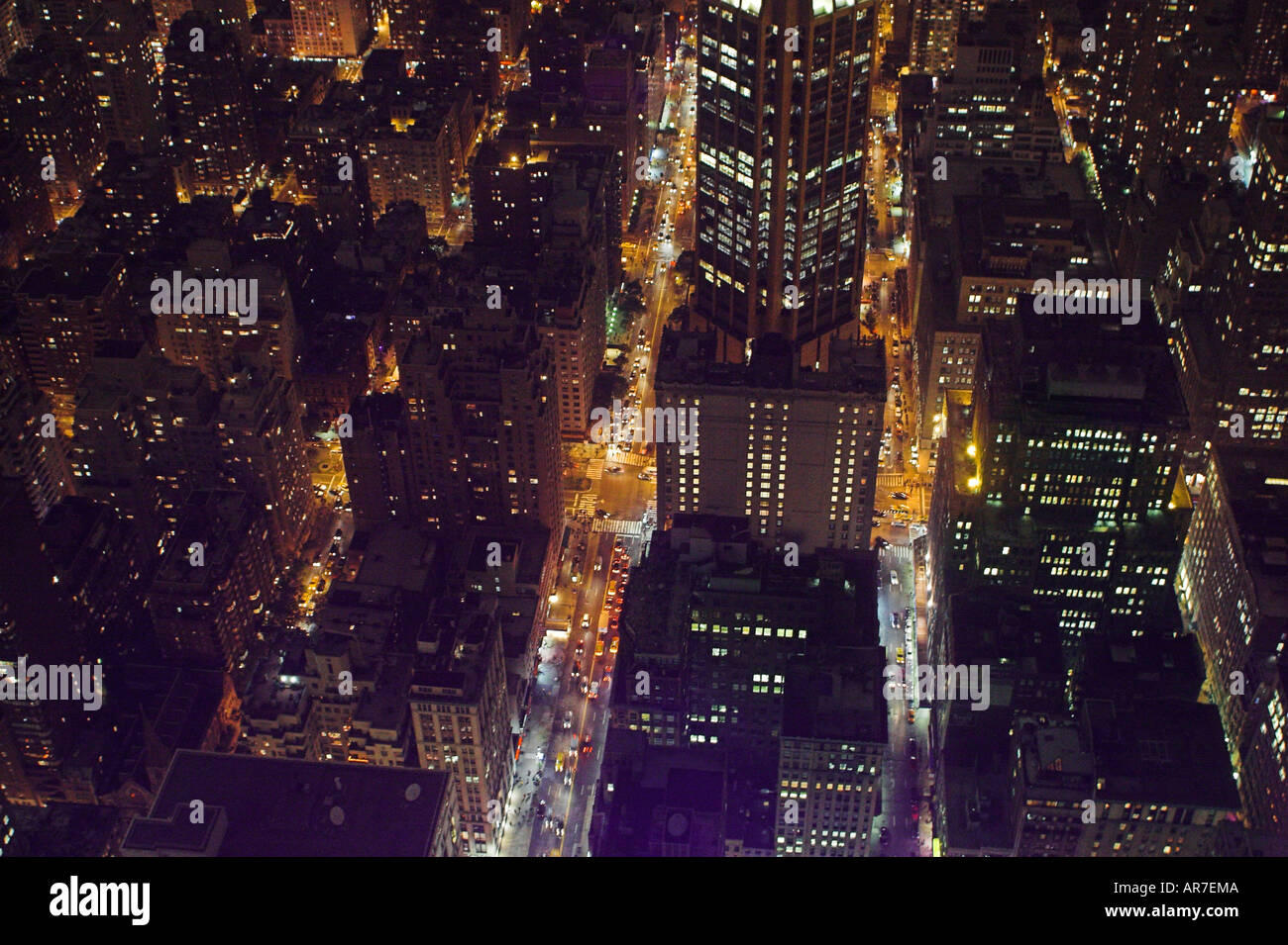 NEW YORK CITY SKYLINE AT NIGHT from Empire State Building looking along ...