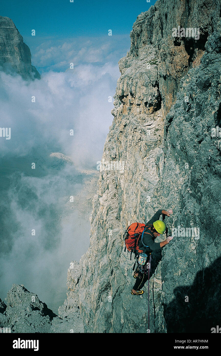 Rock climbers on the wall of Campanile Basso, Brenta Dolomites Italian Alps Italy. Stock Photo