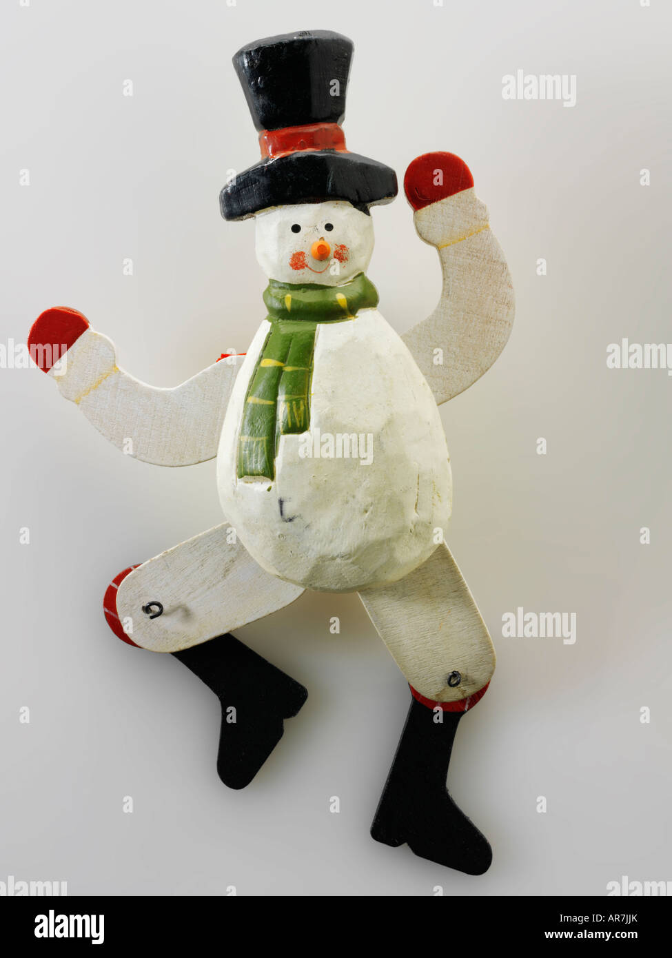 hand painted festive wooden snowman Christmas decoration Stock Photo