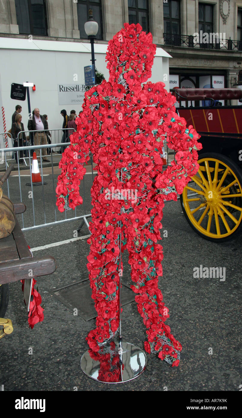 Poppy man red poppy to support The Royal British Legion poppy campaign  Stock Photo - Alamy