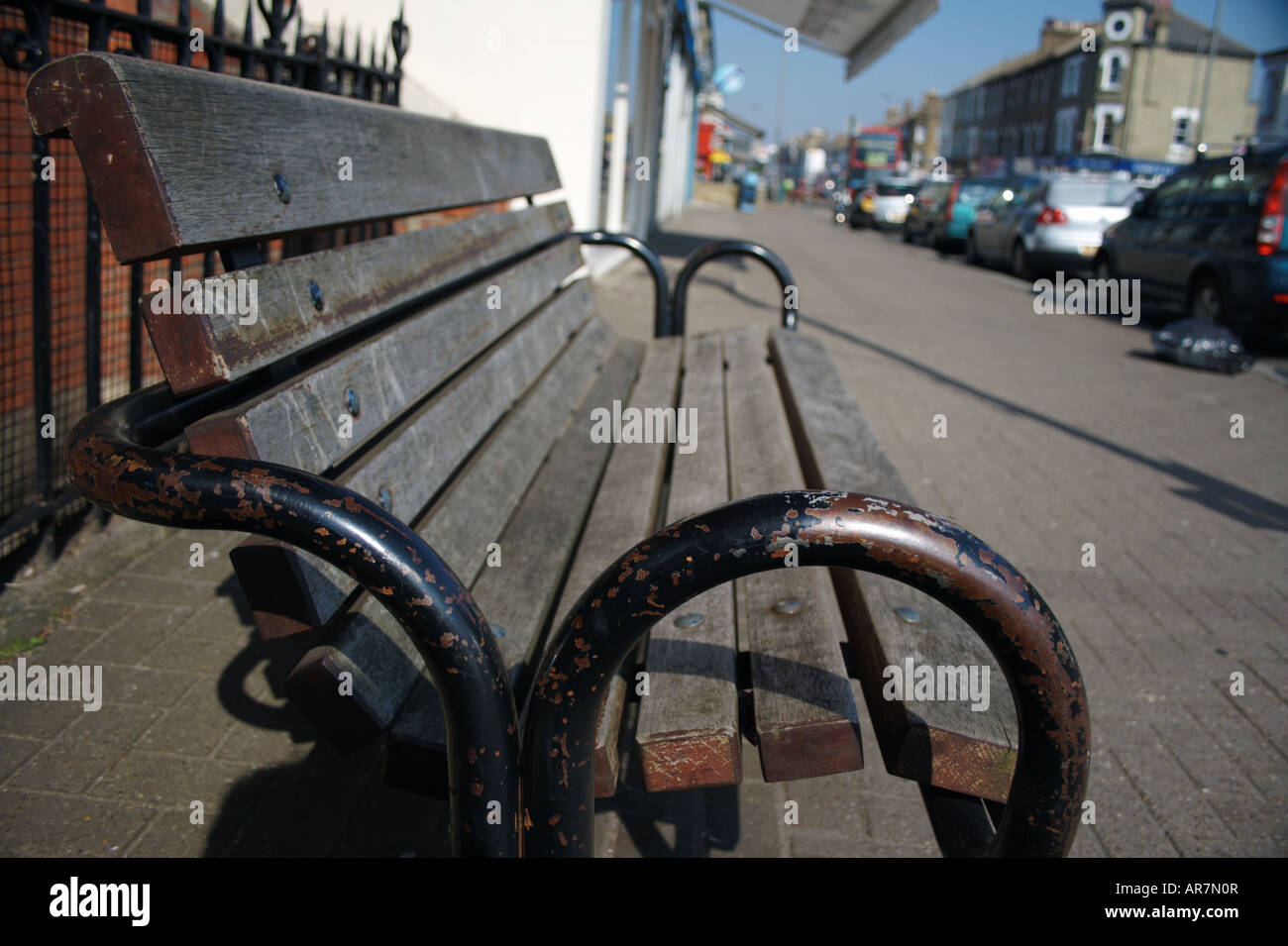 Wood and Metal Bench in Clapham, South England. Stock Photo