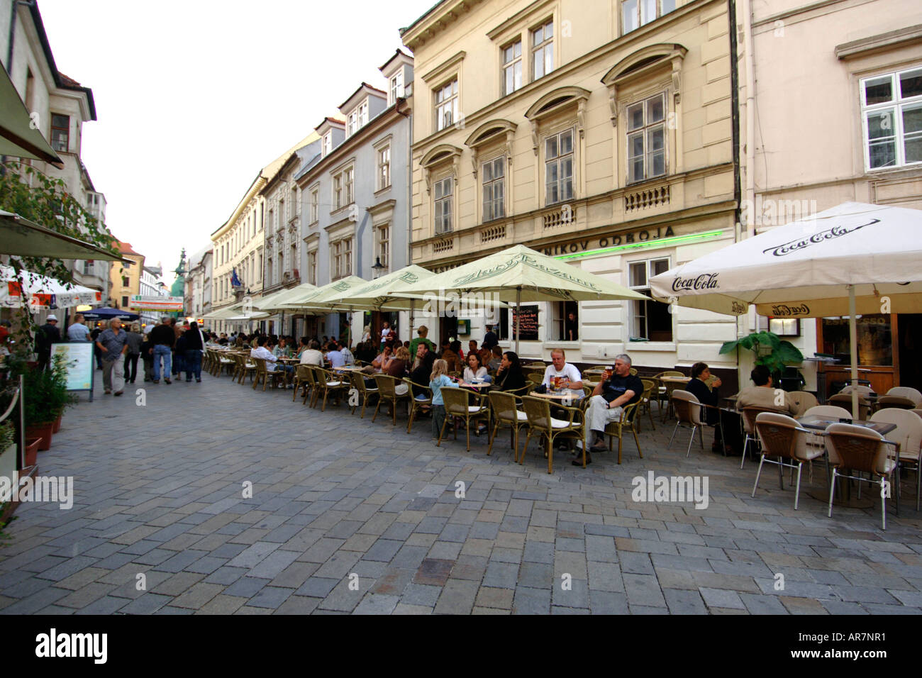 Street-side cafes and restaurants in the old town in Bratislava in Slovakia. Stock Photo