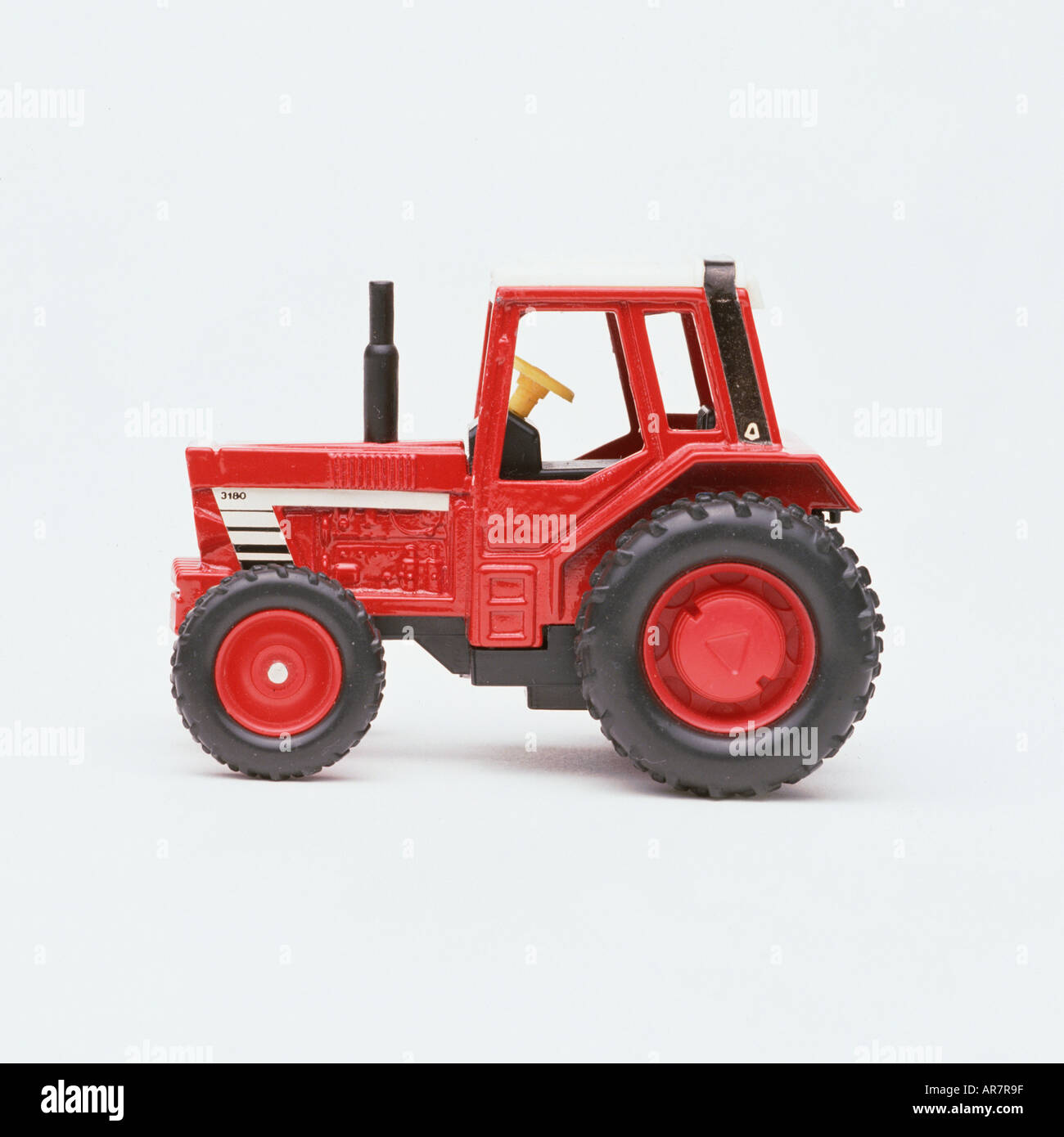 Red toy tractor Stock Photo