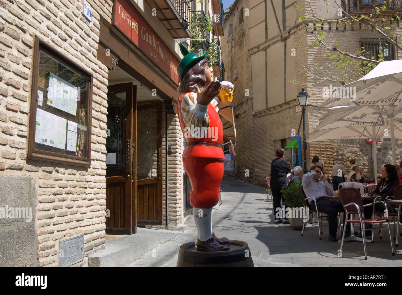 Barrel with mannequin near entrance of restaurant Gambrinus,Toledo, Spain Stock Photo