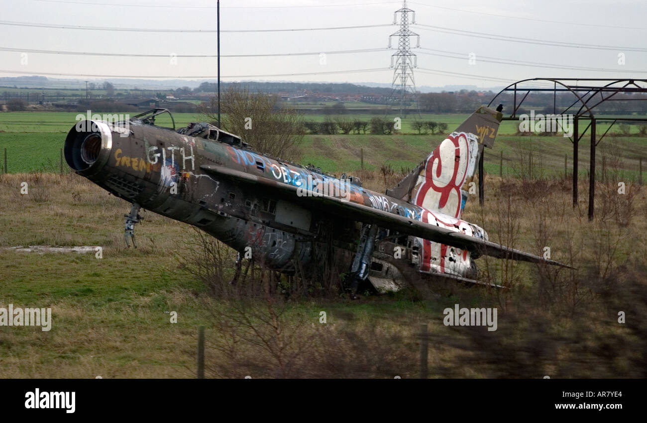 Aircraft English Electric Lightning F2A left derelict and covered in Graffiti at Balderton in Nottinghamshire in England Stock Photo