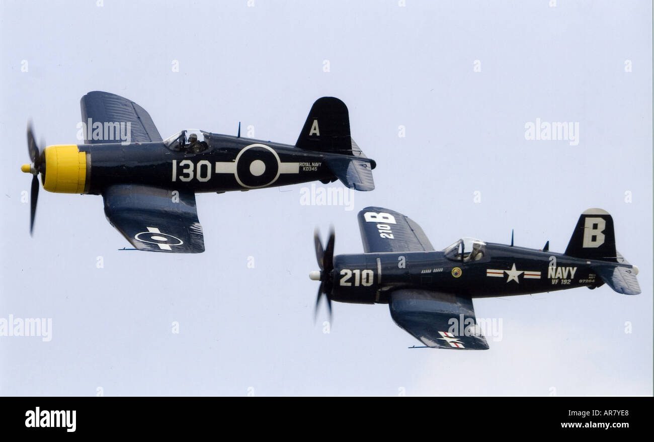 Goodyear FG 1D Corsair and CV F4U 4 Corsair formate for a flypast at Duxfords Flying Legends Show Stock Photo
