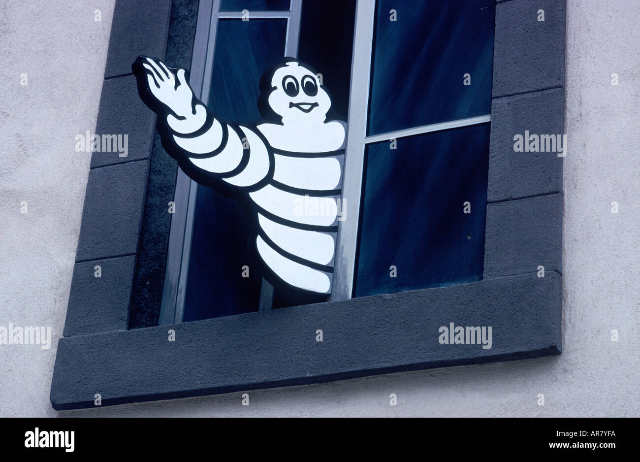 The Michelin bibendum that was mounted on the top of the windshield of the  breakdown trucks Stock Photo - Alamy