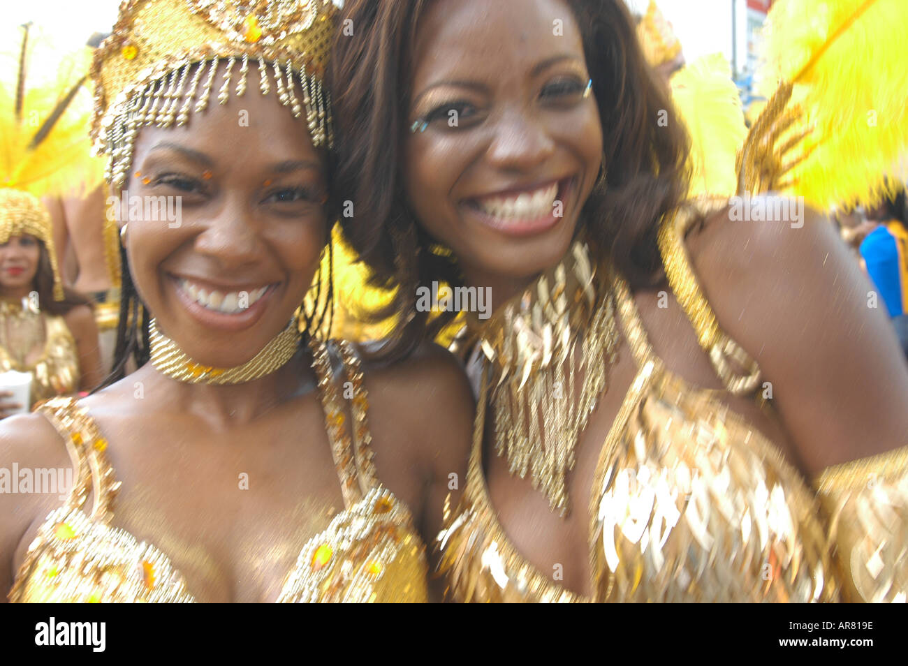 Two women, carnival street scene, Trinidad Stock Photo