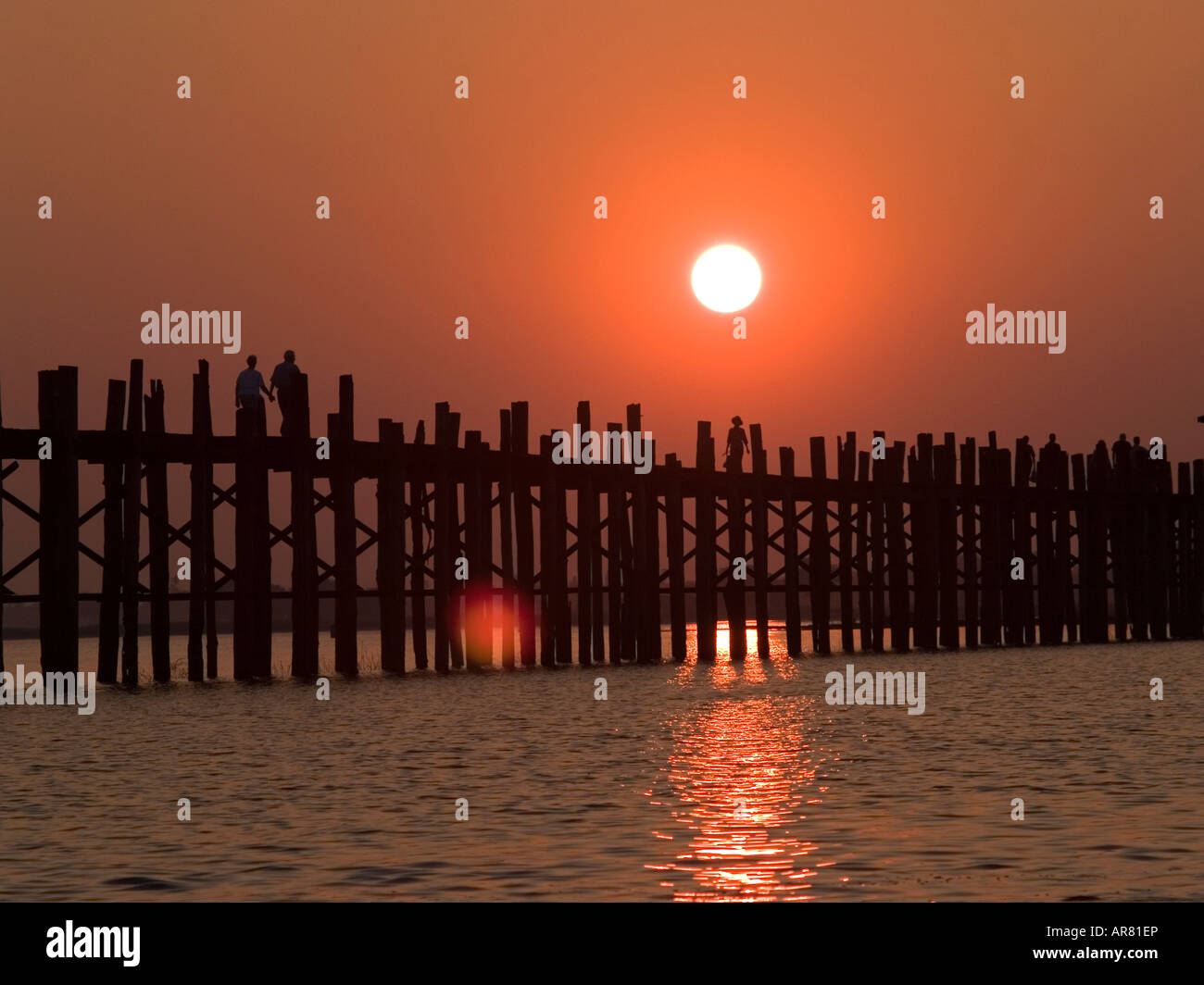 sunset at the U Bein teak bridge in Myanmar Stock Photo - Alamy