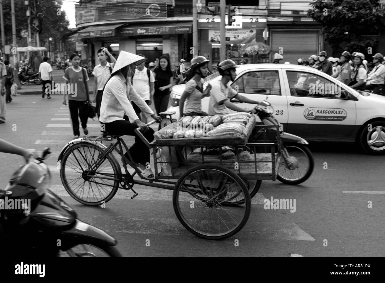 Hustle and Bustle on streets of Saigon, Vietnam in Black and White Stock Photo