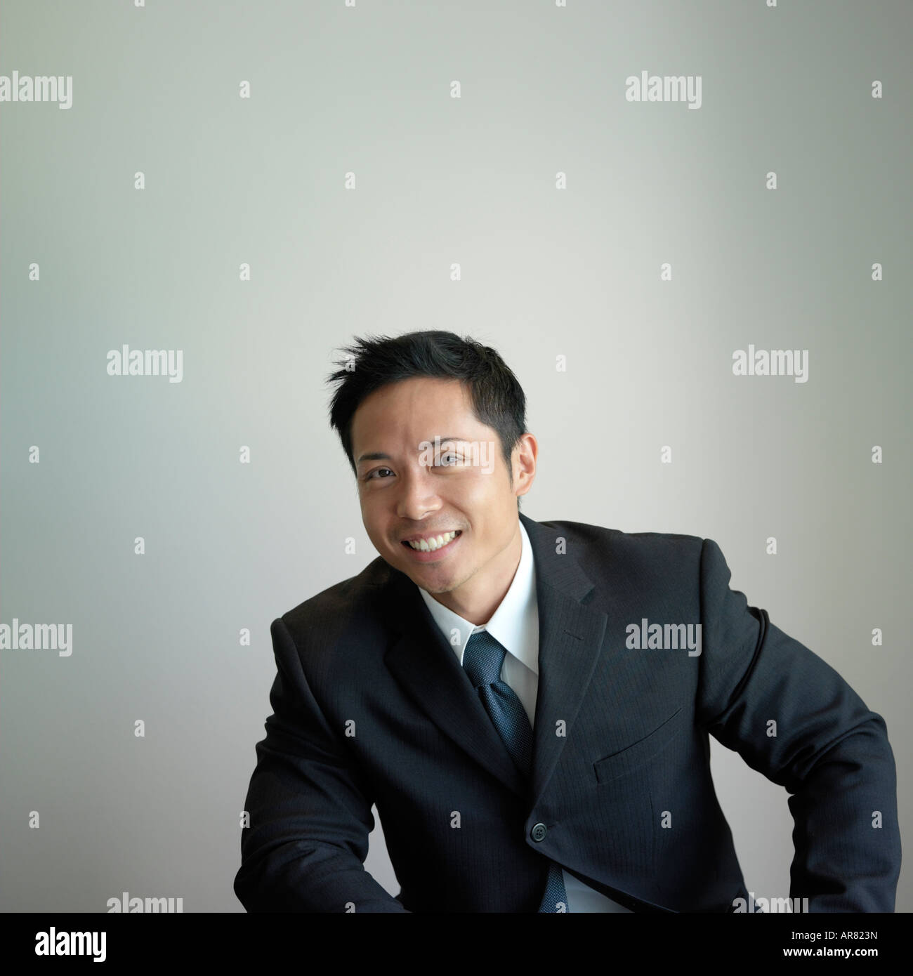 Portrait of a businessman smiling Stock Photo - Alamy
