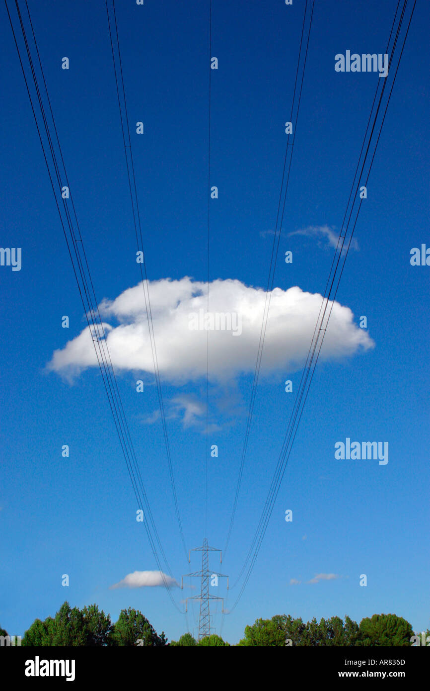 Electricity pylons and lines against blue sky and cloud Stock Photo - Alamy