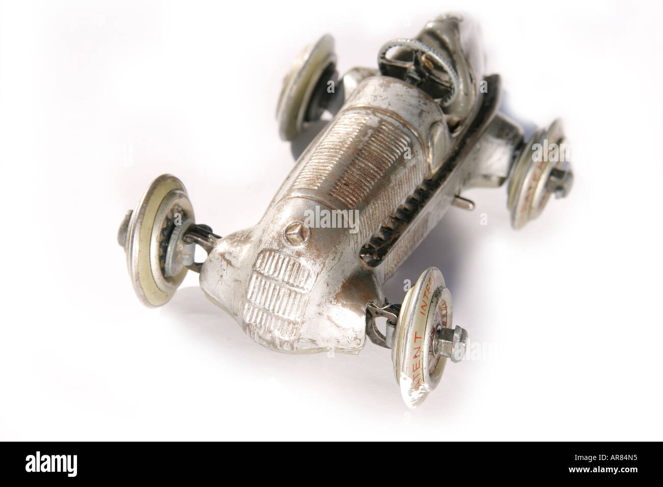 A Mercedes toy racing car model from the 1940 s on white background Stock Photo