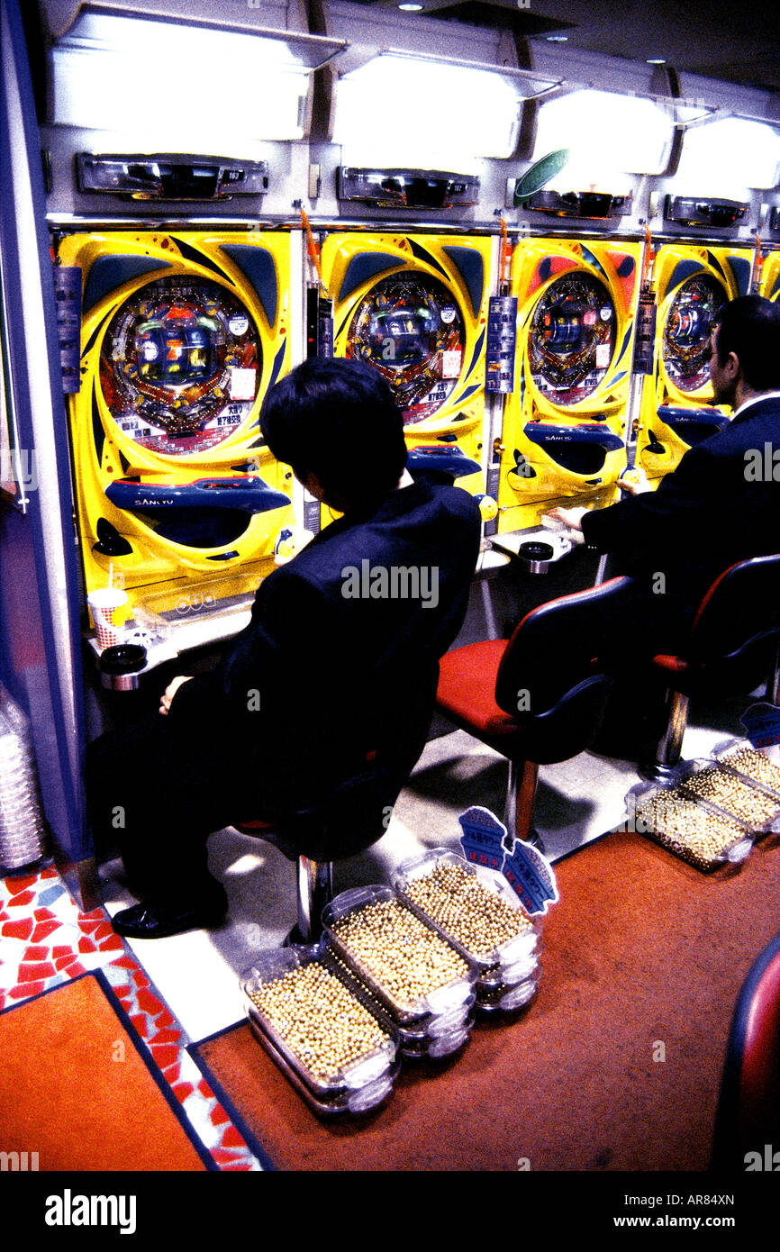 People playing at ‘pachinko’ pinball machines, Tokyo. Stock Photo