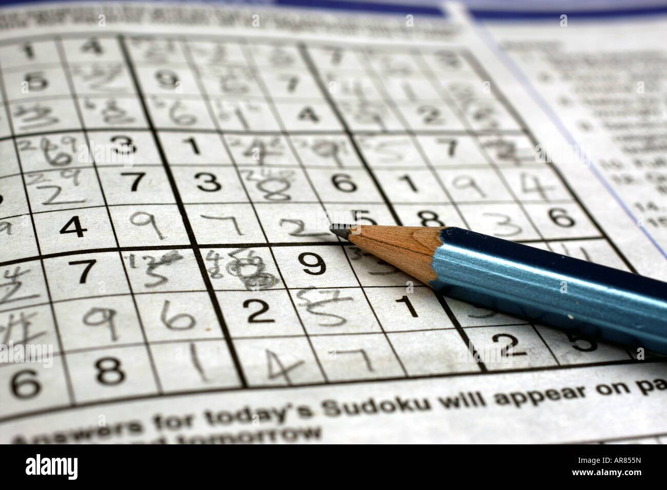 Sudoku puzzle partially filled in in pencil Stock Photo Alamy