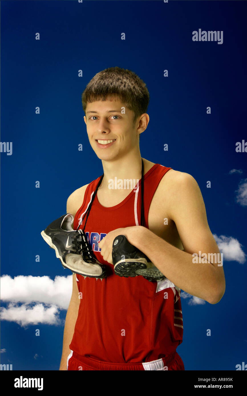 A high school track and field runner with his shoes Stock Photo Alamy