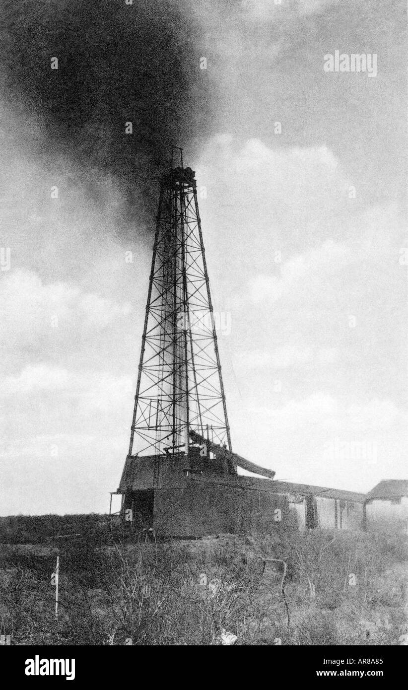 Vintage oil derrick gushing oil hires stock photography and images Alamy