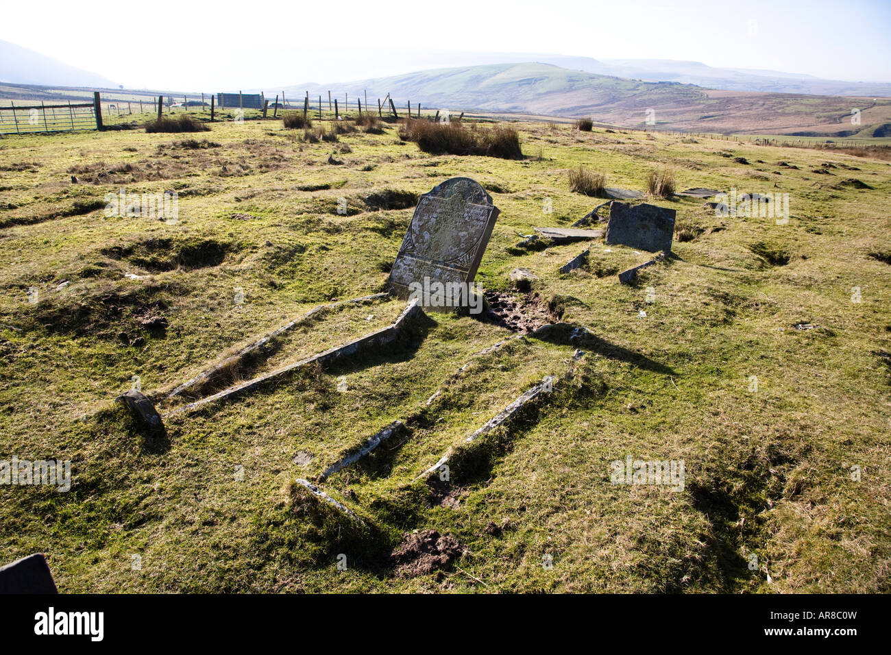 Gravestones in isolated cholera burial ground dated to 1849 on the moors near Tredegar Wales UK Stock Photo