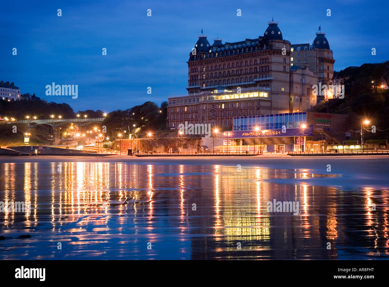 The Grand Hotel Scarborough seen from the beach at dawn Stock Photo