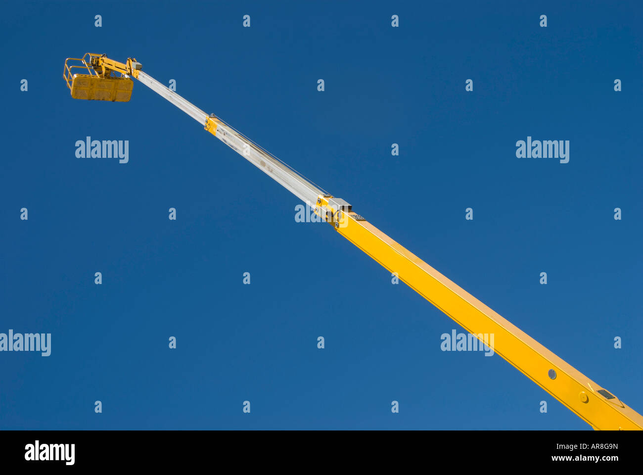 A very tall boom lift Stock Photo