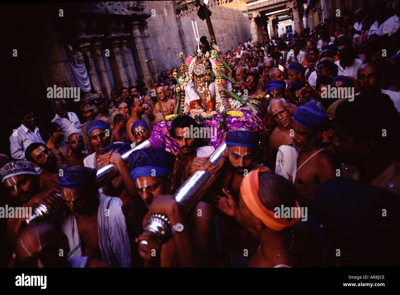 Hindu Brahmins carrying Nataraja deity during a Puja or Poojan ceremony in Nataraja Temple in the town of Chidambaram in Tamil Nadu state South India Stock Photo