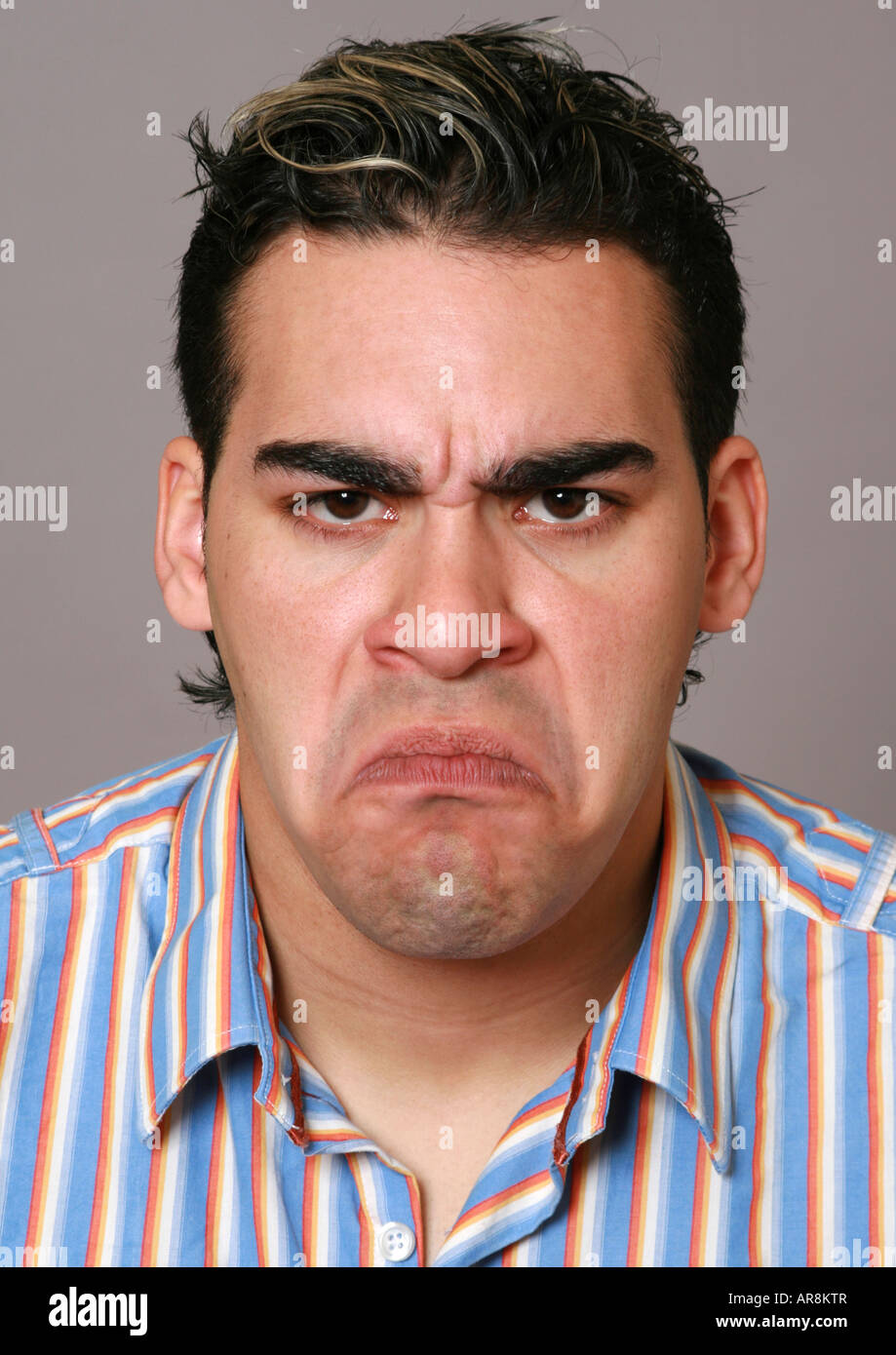 young man with a funny face Stock Photo