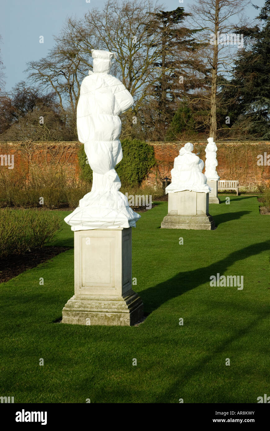Statues wrapped up to protect them from frost in the winter Stock Photo