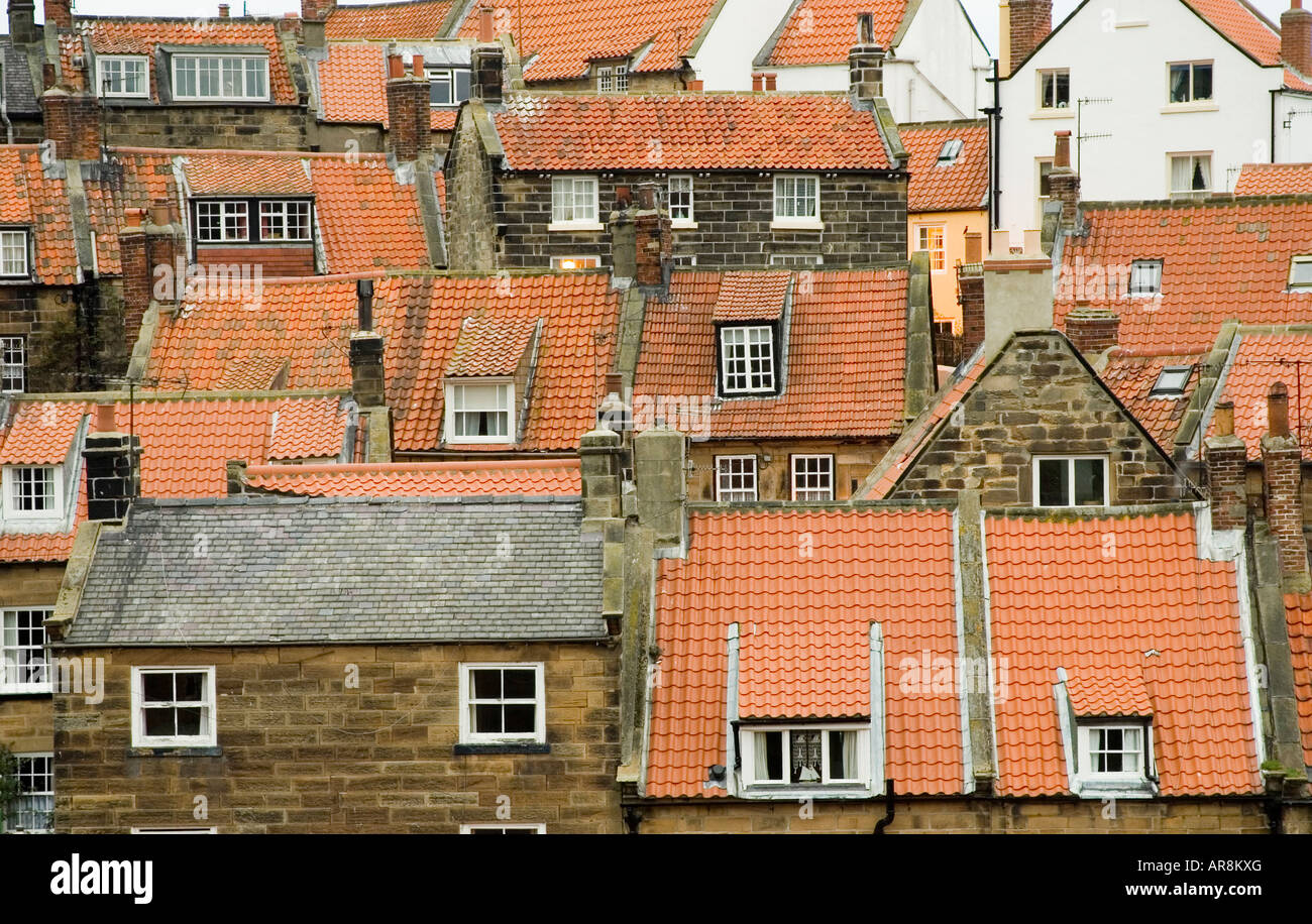 Rooftops with orange tiles Robin Hoods Bay North Yorkshire England Stock Photo