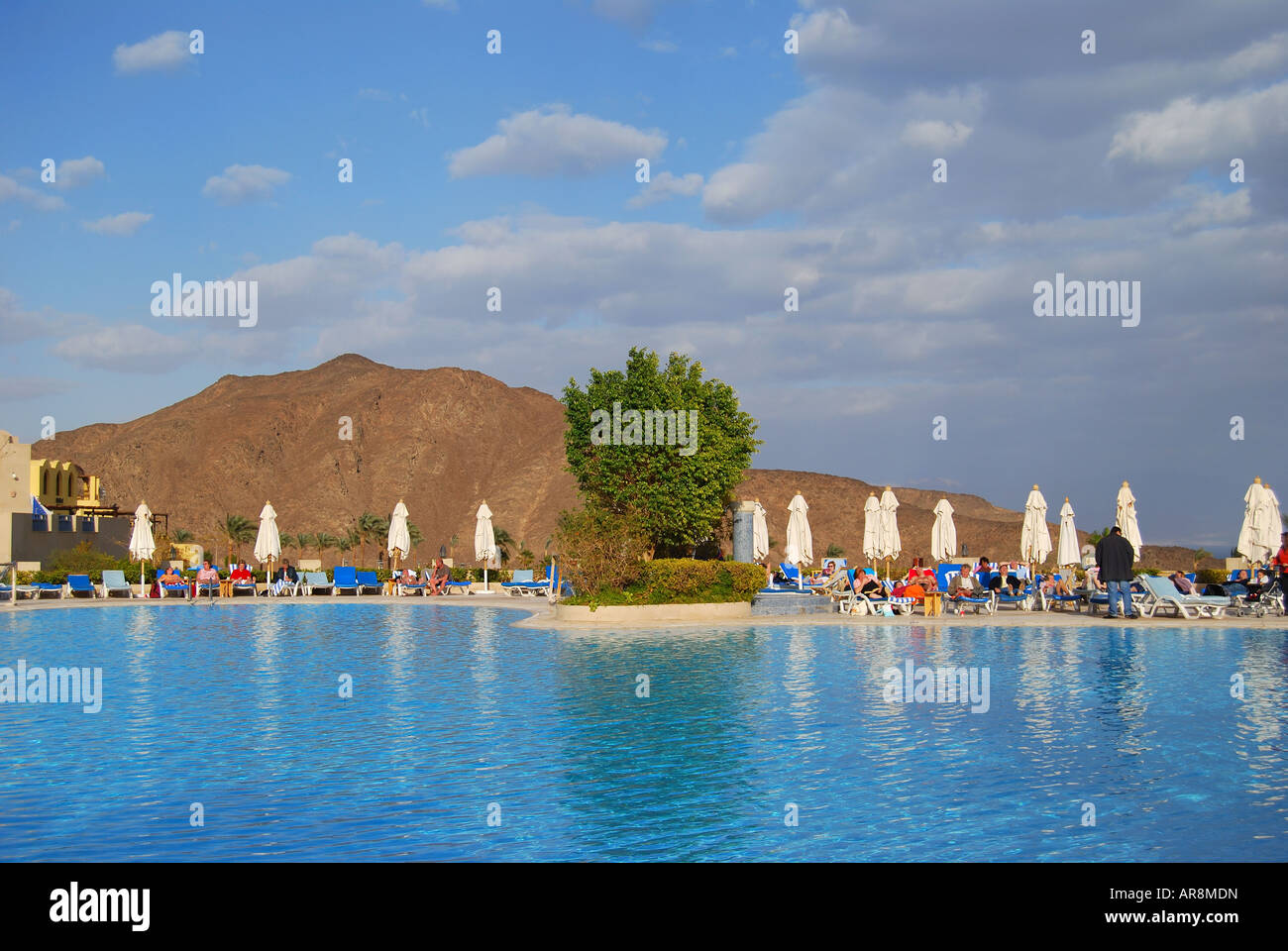 Swimming pool and loungers, Three Corners El Wekala Golf Resort, Taba Heights, Sinai Peninsula, Republic of Egypt Stock Photo