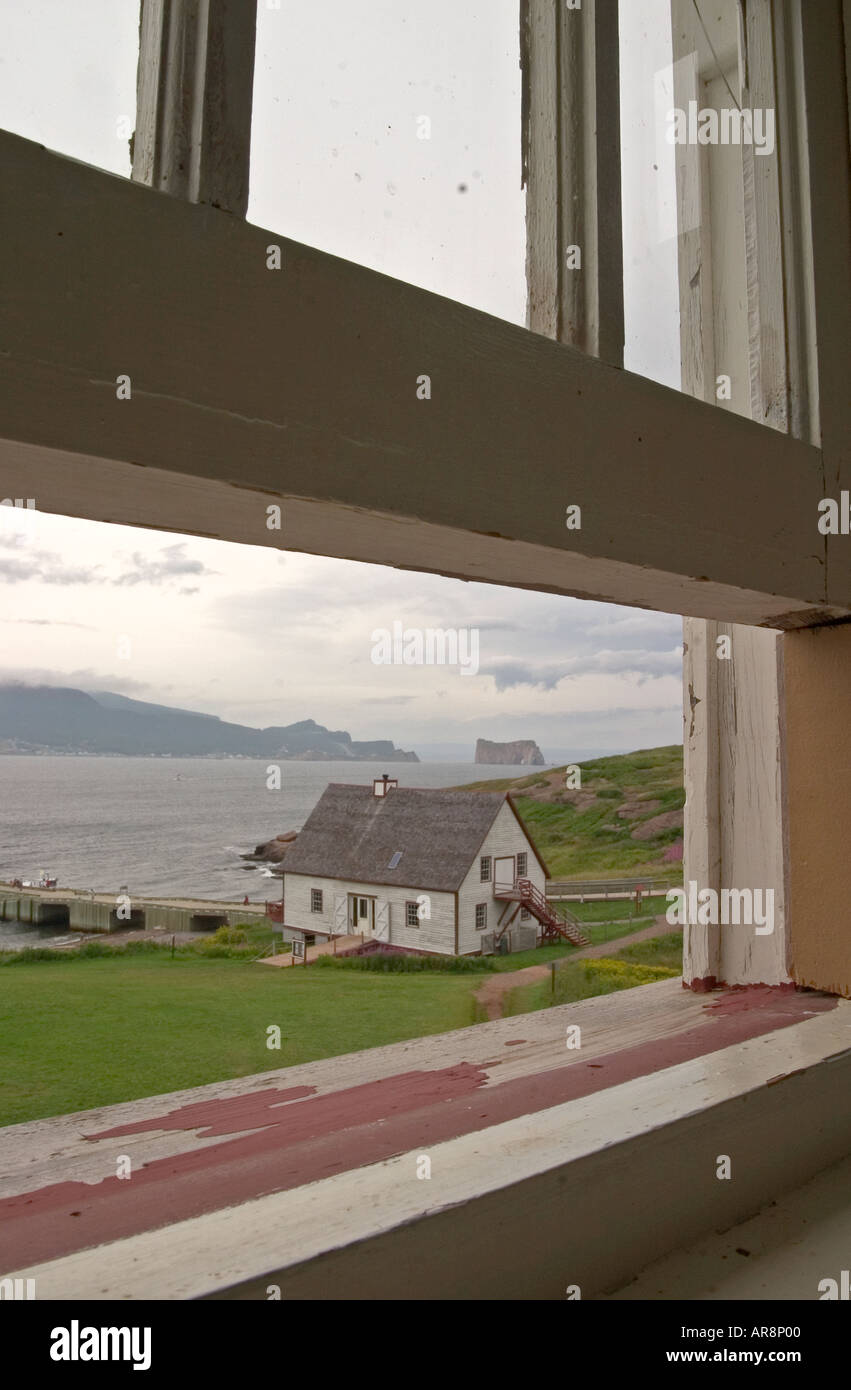 Colonial house seen through window, Bonaventure Island, Gaspesie Stock Photo
