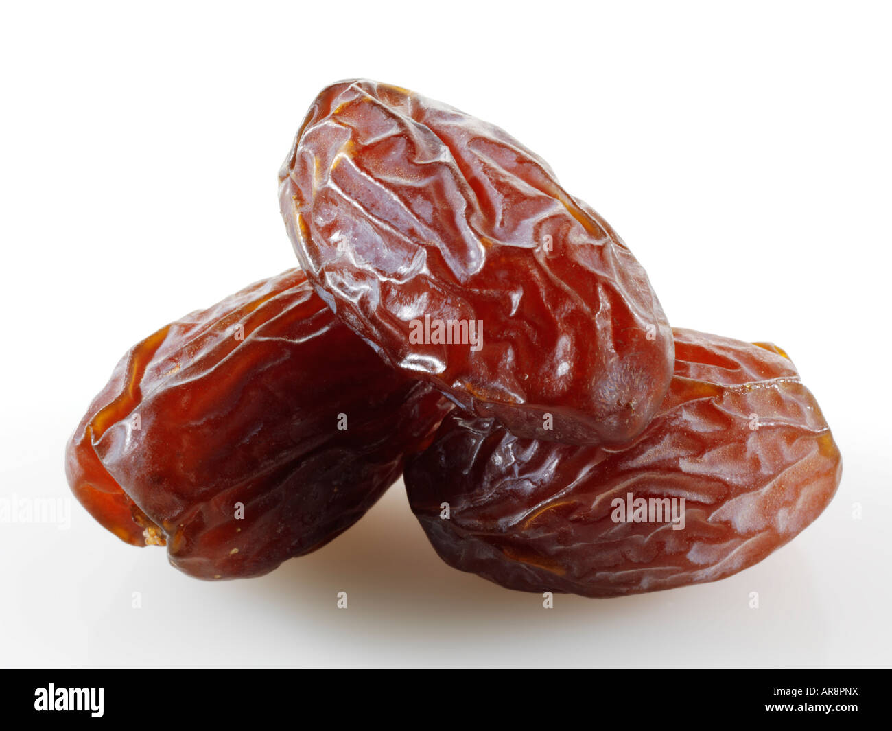 Fresh whole dried dates Fresh whole dates against a white background