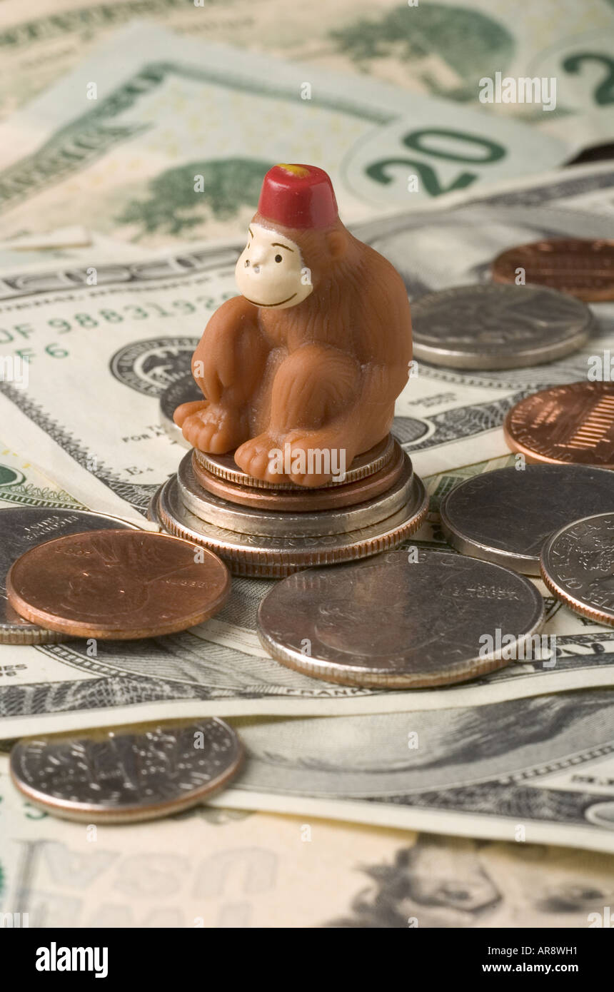 monkey and money Stock Photo Alamy