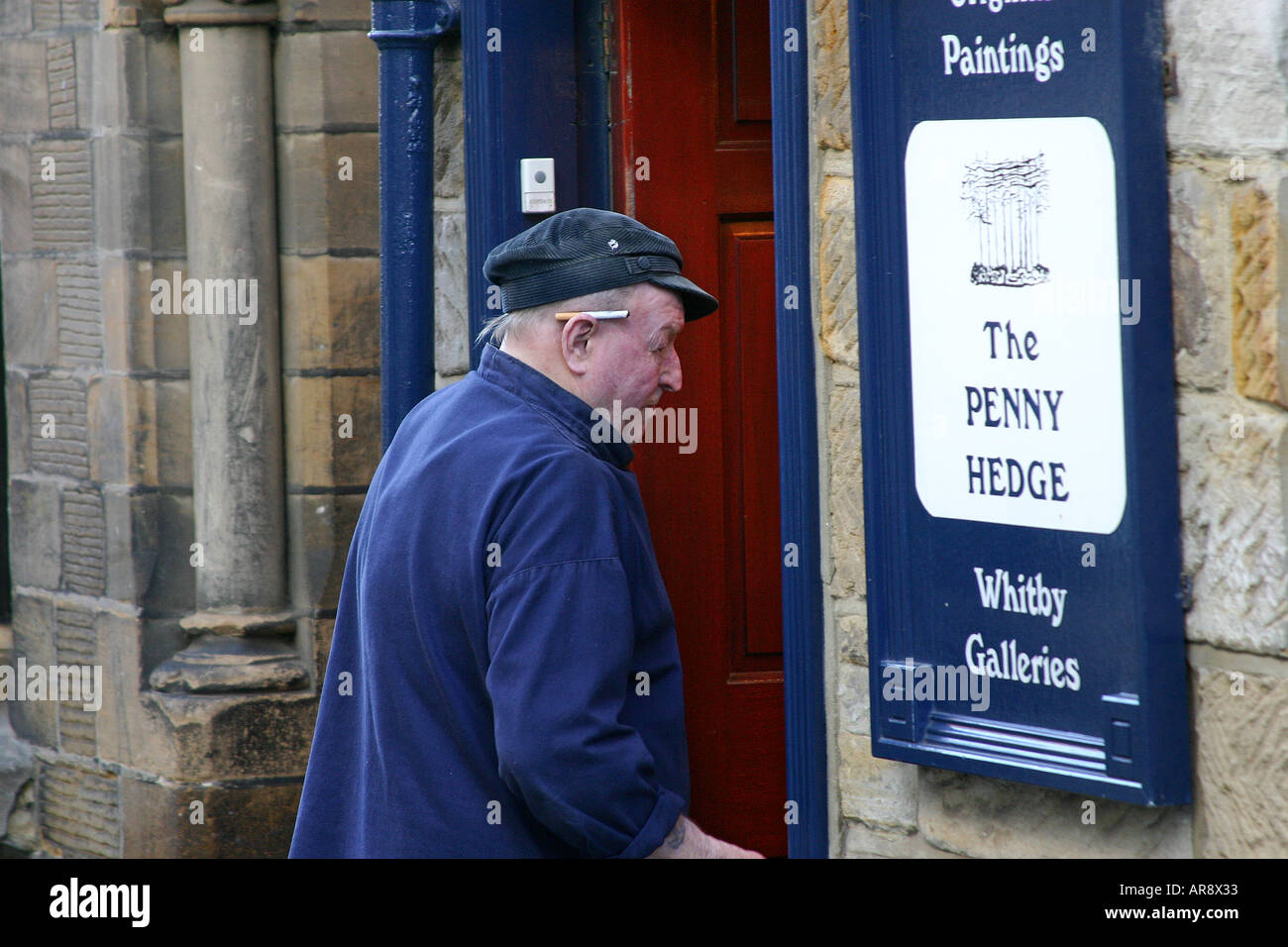 Old man with cigarette behind ear Stock Photo