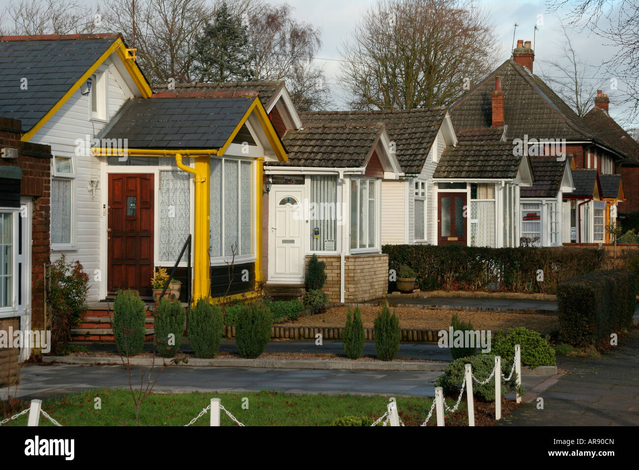 Wooden bungalows on the Austin village site Longbridge England UK Stock