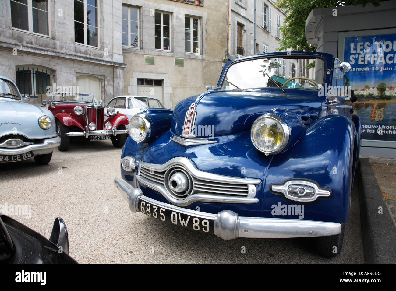Vintage Cars in Auxerre, Burgundy, France, featuring a Panhard Dyna in the foreground. Stock Photo