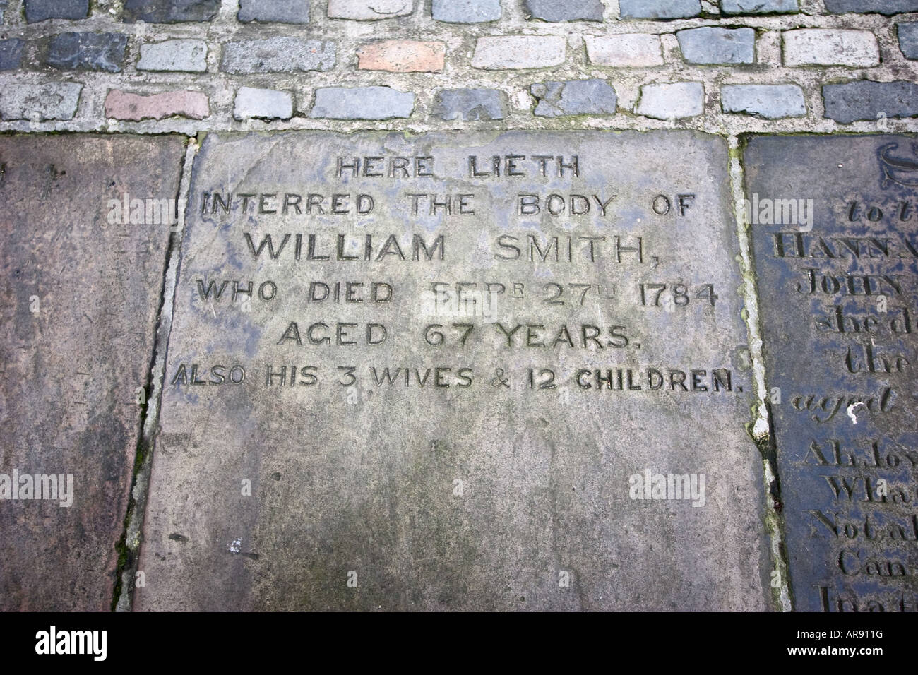 A memorial marker in the sidewalk in front of the Leeds Parish Church in Leeds England December 12 2007 Stock Photo