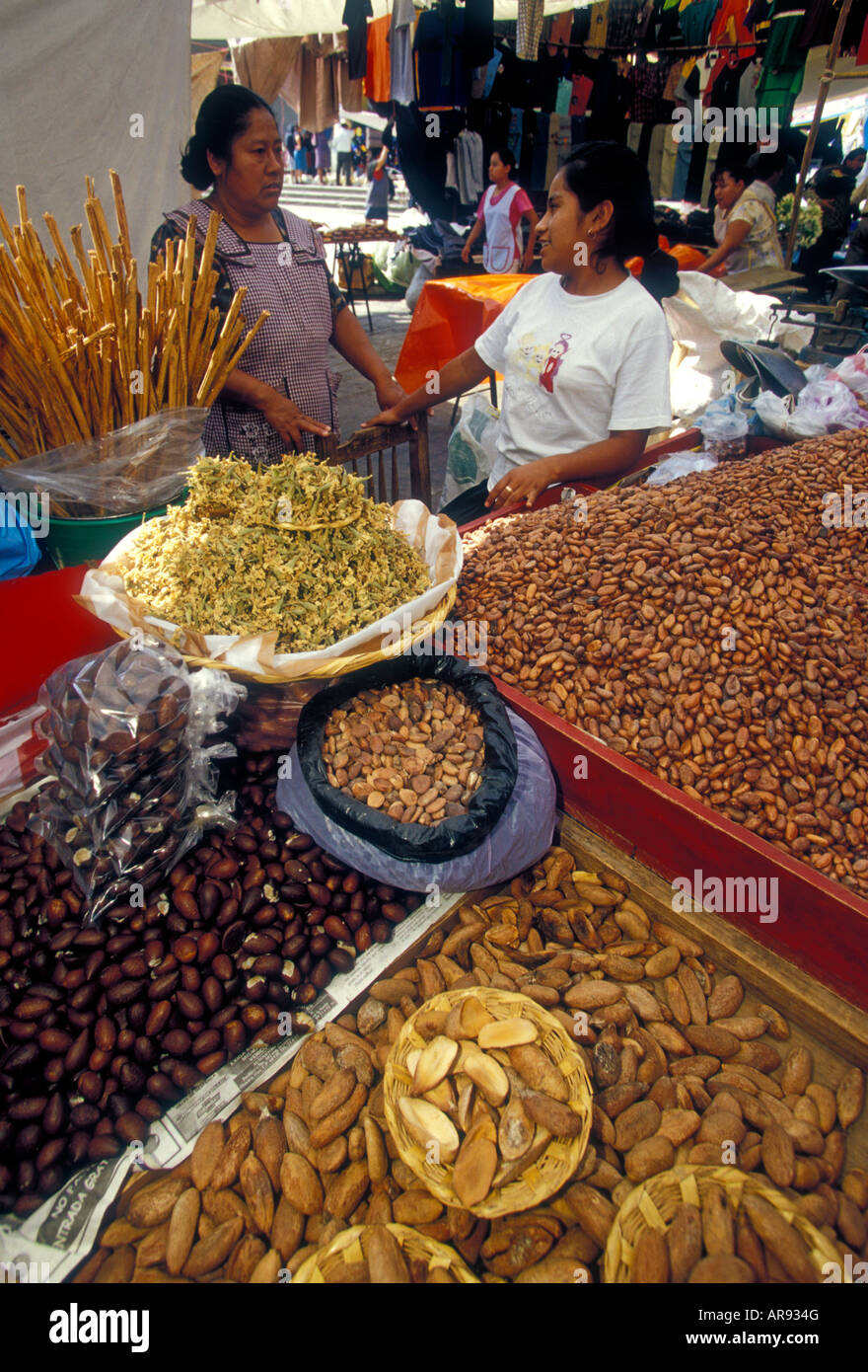 Mexican woman, food vendor, selling, cocoa, chocolate beans, Friday Market, village of Ocotlan de Morelos, Ocotlan de Morelos, Oaxaca State, Mexico Stock Photo